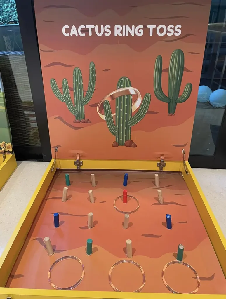 Game booth rental Cactus ring toss in singapore by Partyfans.